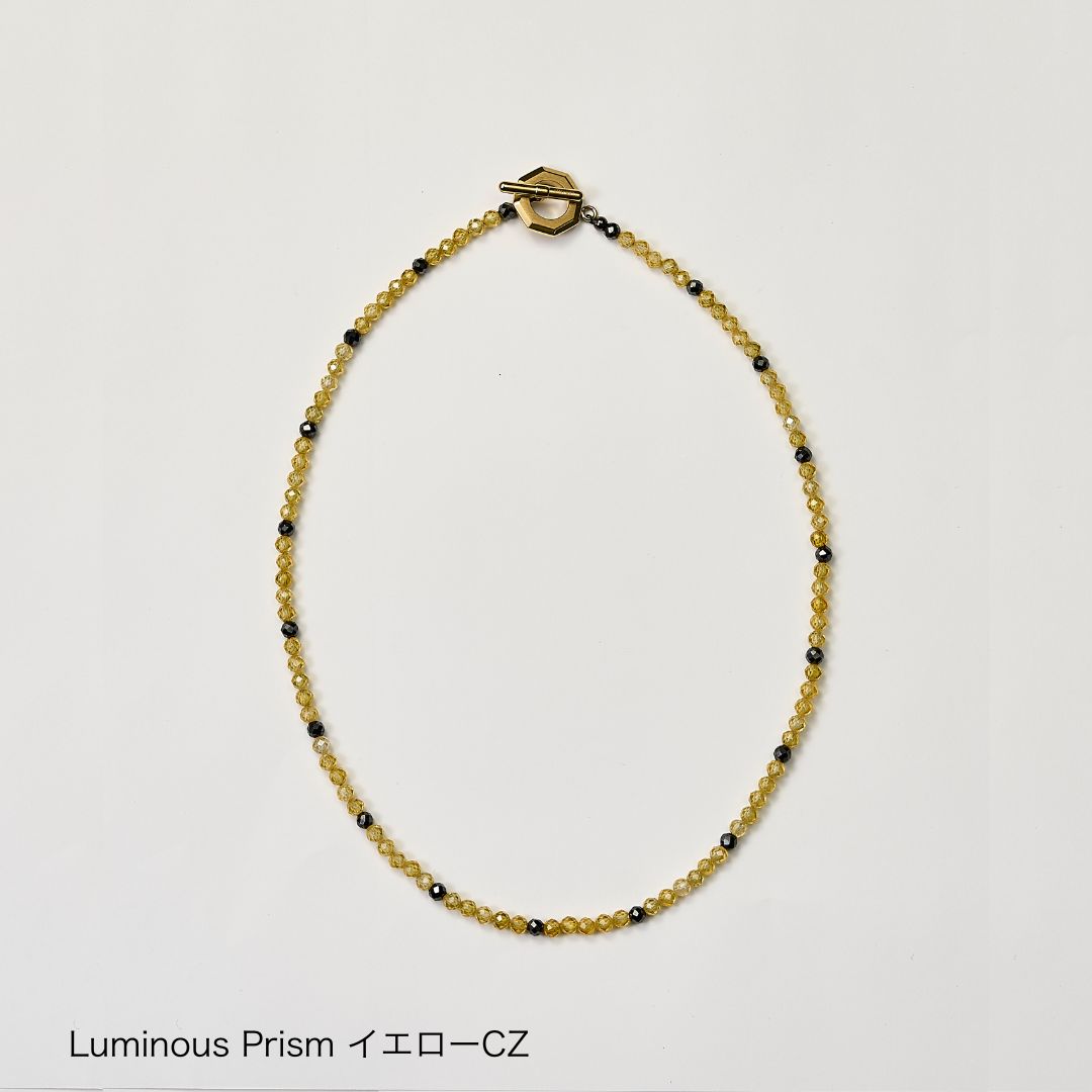UNrust アンラスト Luminous Prism ルミナス プリズム 磁気ネックレス イエローCZ 商品単体 俯瞰