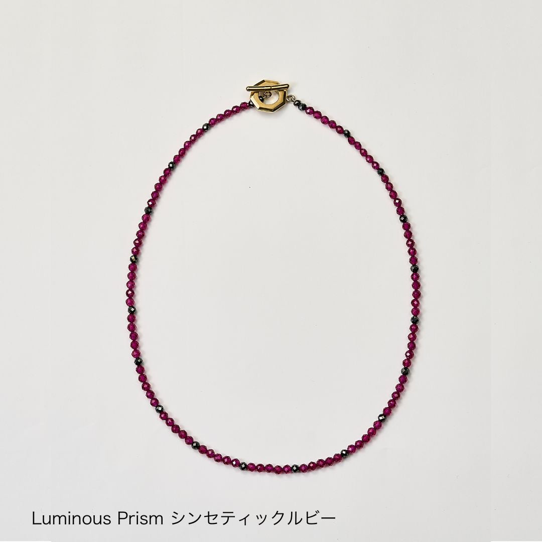 UNrust アンラスト Luminous Prism ルミナス プリズム 磁気ネックレス シンセティック ルビー 商品単体 俯瞰